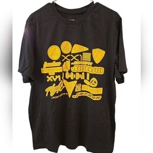 AIR JORDAN BLACK AND YELLOW GRAPHIC T- SHIRT. SIZE X-LARGE.